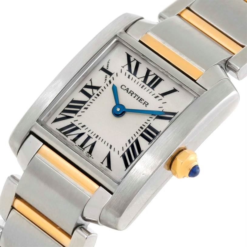 The image shows a close-up of the Cartier Tank Francaise W51007Q4 Women's Steel and Gold (two tone) Silver Dial W51007Q4 Women's Steel and Gold (two tone) Silver Dial watch face, crown, and part of the two-tone bracelet at an oblique angle.