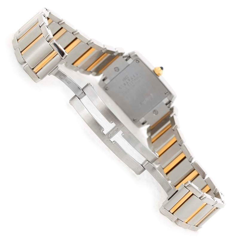 The image shows the back and bracelet of a Cartier Tank Francaise W51007Q4 Women's Steel and Gold (two tone) Silver Dial W51007Q4 Women's Steel and Gold (two tone) Silver Dial watch, highlighting the dual-tone metal links and clasp.