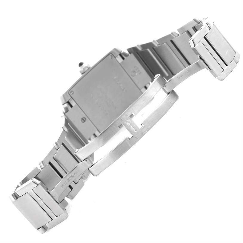 The image displays the clasp and back of the Cartier Tank Française watch at an angled, slightly open position.