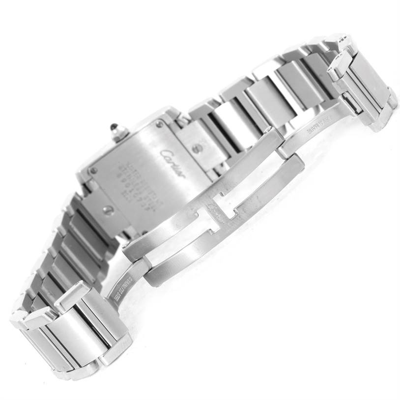 The Cartier Tank Francaise W51008Q3 Women's Stainless Steel Silver Dial W51008Q3 Women's Stainless Steel Silver Dial watch is shown from the back, highlighting the case back, bracelet, and deployment clasp.