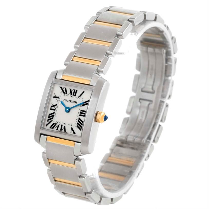 This image shows a Cartier Tank Française watch at a three-quarter angle, highlighting its silver and gold-tone bracelet, dial, and crown.