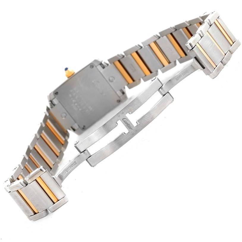 The image shows the back and clasp of a Cartier Tank Francaise W51007Q4 Women's Steel and Gold (two tone) Silver Dial W51007Q4 Women's Steel and Gold (two tone) Silver Dial watch, highlighting its metal bracelet.