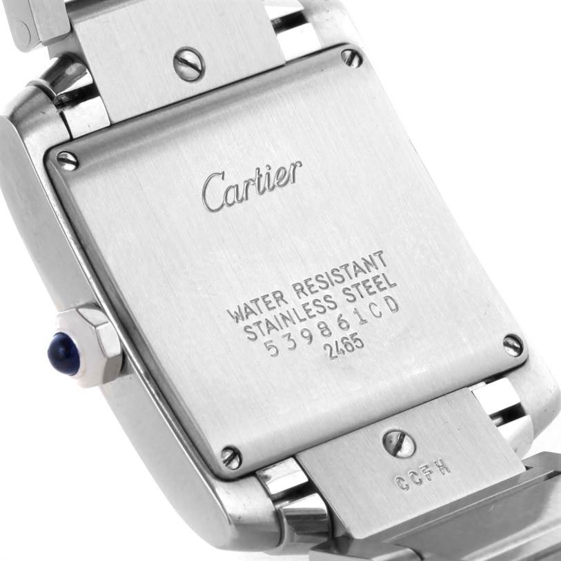 The image shows the back casing and part of the bracelet of a Cartier Tank Francaise W51011Q3 Women's Stainless Steel Silver Dial W51011Q3 Women's Stainless Steel Silver Dial watch.