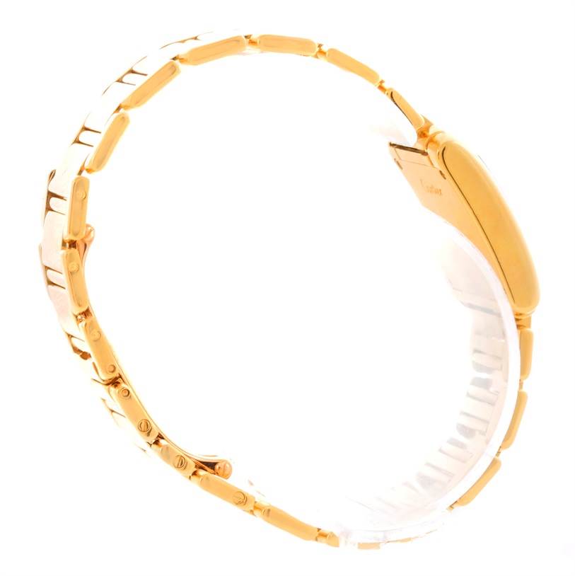 The image shows a side view of a Cartier Tank Française watch, highlighting its gold bracelet and case.