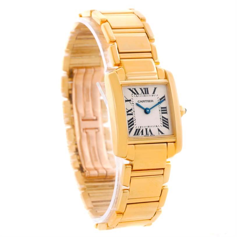 The image shows a side angle view of a Cartier Tank Francaise W50002N2 Women's Yellow Gold Silver Dial W50002N2 Women's Yellow Gold Silver Dial watch, highlighting its gold bracelet and rectangular face with Roman numerals.