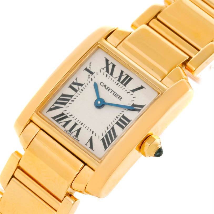 The image shows a close-up angle of the Cartier Tank Francaise W50002N2 Women's Yellow Gold Silver Dial W50002N2 Women's Yellow Gold Silver Dial watch, including its face, bracelet, and crown.