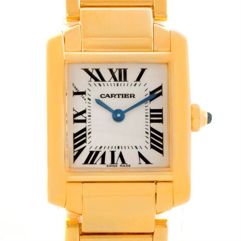 The image shows a close-up of the face and part of the gold bracelet of the Cartier Tank Francaise W50002N2 Women's Yellow Gold Silver Dial W50002N2 Women's Yellow Gold Silver Dial watch.