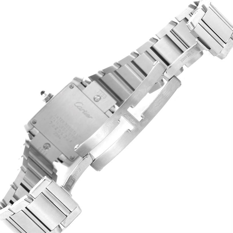 The image shows the underside of a Cartier Tank Francaise W51026Q3 Women's Stainless Steel Black Dial W51026Q3 Women's Stainless Steel Black Dial watch, highlighting the clasp and part of the bracelet.