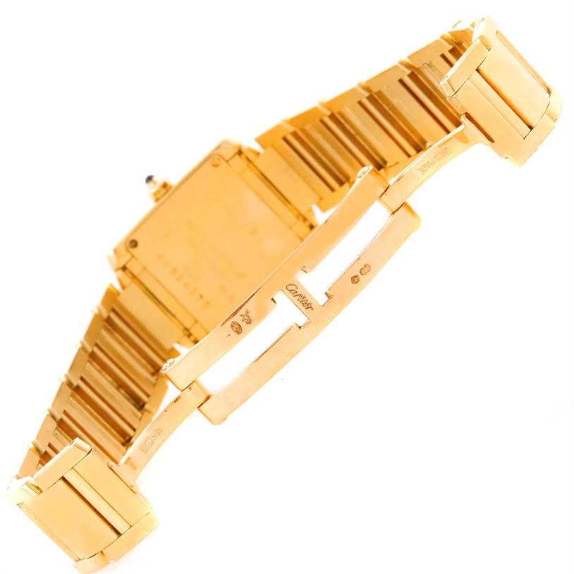 The image shows the back and bracelet of the Cartier Tank Francaise W50002N2 Women's Yellow Gold Silver Dial W50002N2 Women's Yellow Gold Silver Dial watch, highlighting the deployment clasp and bracelet links.