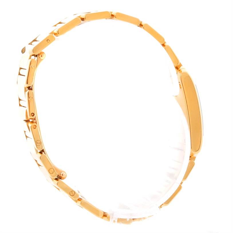 The image shows a side view of the gold bracelet and case of a Cartier Tank Francaise W50002N2 Women's Yellow Gold Silver Dial W50002N2 Women's Yellow Gold Silver Dial watch.