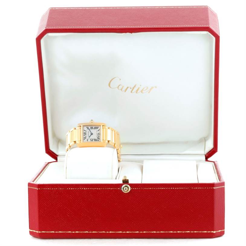 The Cartier Tank Francaise W50002N2 Women's Yellow Gold Silver Dial W50002N2 Women's Yellow Gold Silver Dial watch is displayed head-on in an open red and white Cartier box.