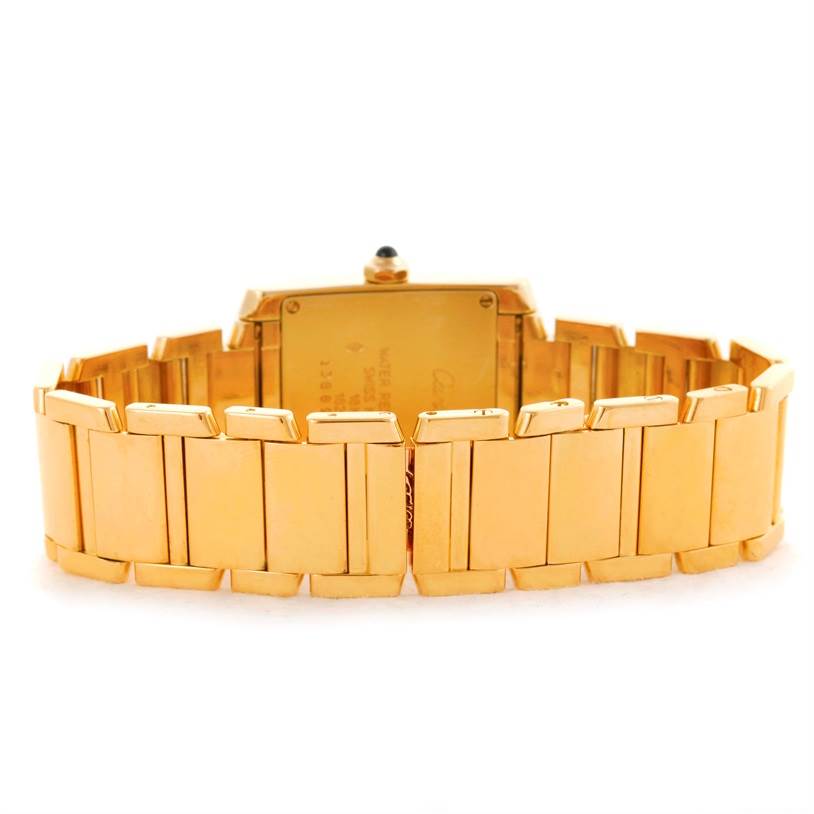 This image shows the back and bracelet of the Cartier Tank Française watch.