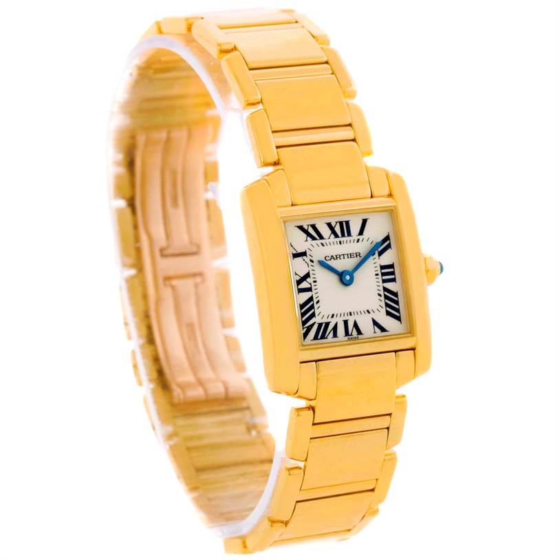 The image shows a partial side angle of a Cartier Tank Francaise W50002N2 Women's Yellow Gold Silver Dial W50002N2 Women's Yellow Gold Silver Dial watch, highlighting its gold bracelet and rectangular face.