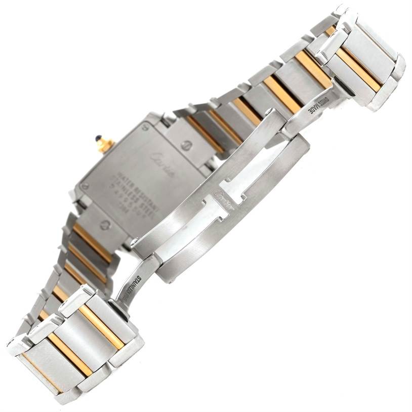 The image shows the back and clasp of a Cartier Tank Francaise W51007Q4 Women's Steel and Gold (two tone) Silver Dial W51007Q4 Women's Steel and Gold (two tone) Silver Dial watch with a partially open metal and gold bracelet.