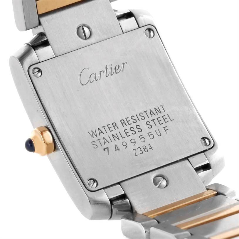 The image shows the back casing and part of the bracelet of the Cartier Tank Francaise W51007Q4 Women's Steel and Gold (two tone) Silver Dial W51007Q4 Women's Steel and Gold (two tone) Silver Dial watch.