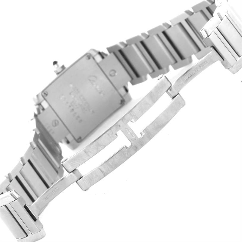 The image shows the underside of the Cartier Tank Francaise W51008Q3 Women's Stainless Steel Silver Dial W51008Q3 Women's Stainless Steel Silver Dial watch with a focus on the clasp and part of the bracelet.