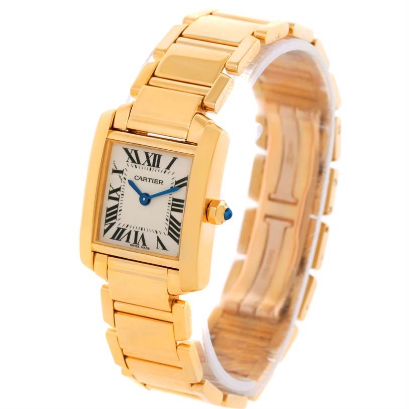 This image shows a Cartier Tank Francaise W50002N2 Women's Yellow Gold Silver Dial W50002N2 Women's Yellow Gold Silver Dial watch at a slight angle, highlighting its gold rectangular case, bracelet, and Roman numeral dial.