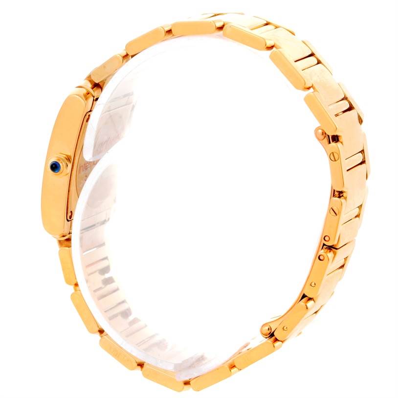 Side view of the Cartier Tank Française watch showing the bracelet and crown.