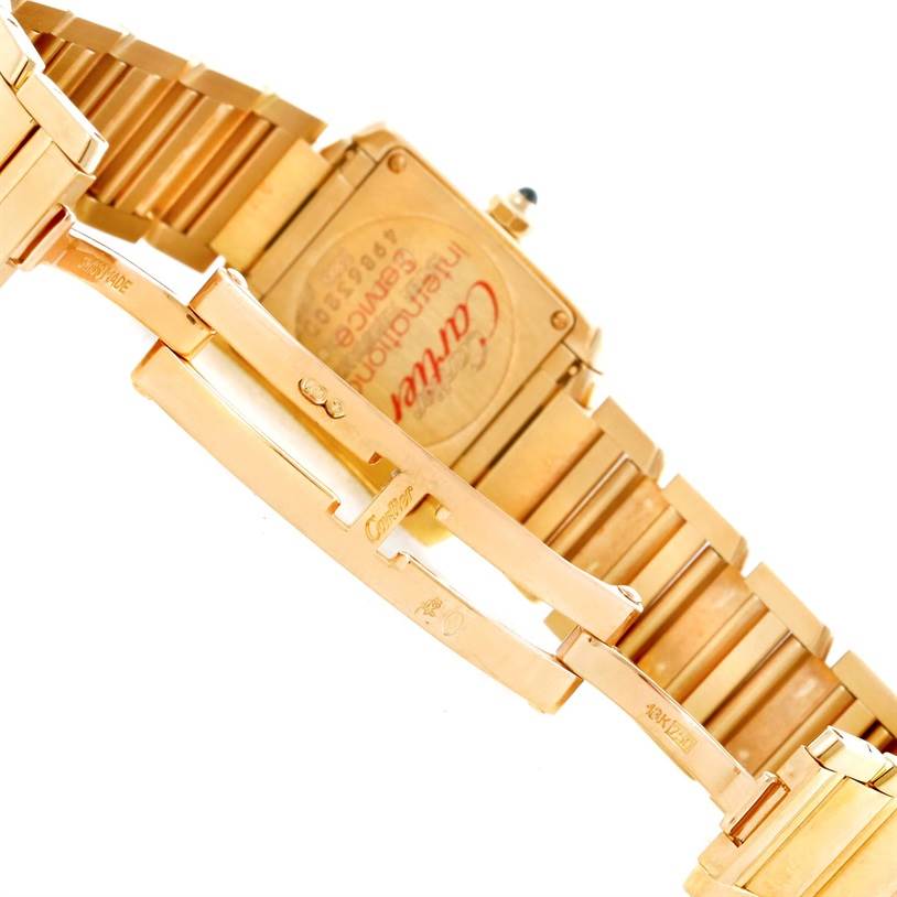 The image shows the clasp and the back of the case for the Cartier Tank Française watch.