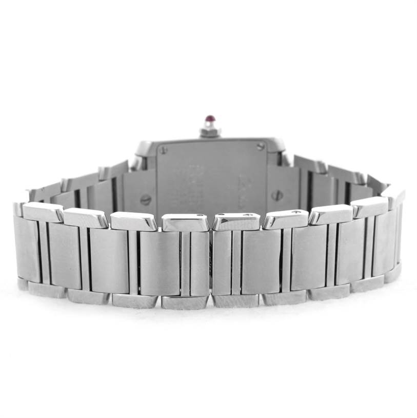 This image shows the back view of a Cartier Tank Française watch, focusing on its metal bracelet links and caseback.