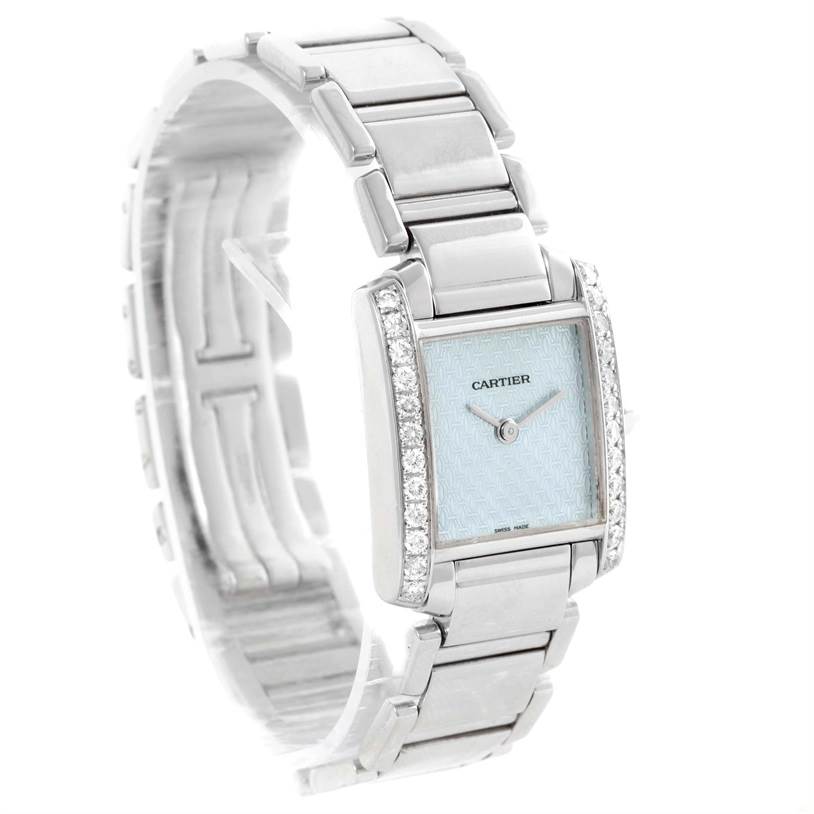 The image shows a side angle of the Cartier Tank Française watch, highlighting its bracelet and diamond-accented rectangular dial.