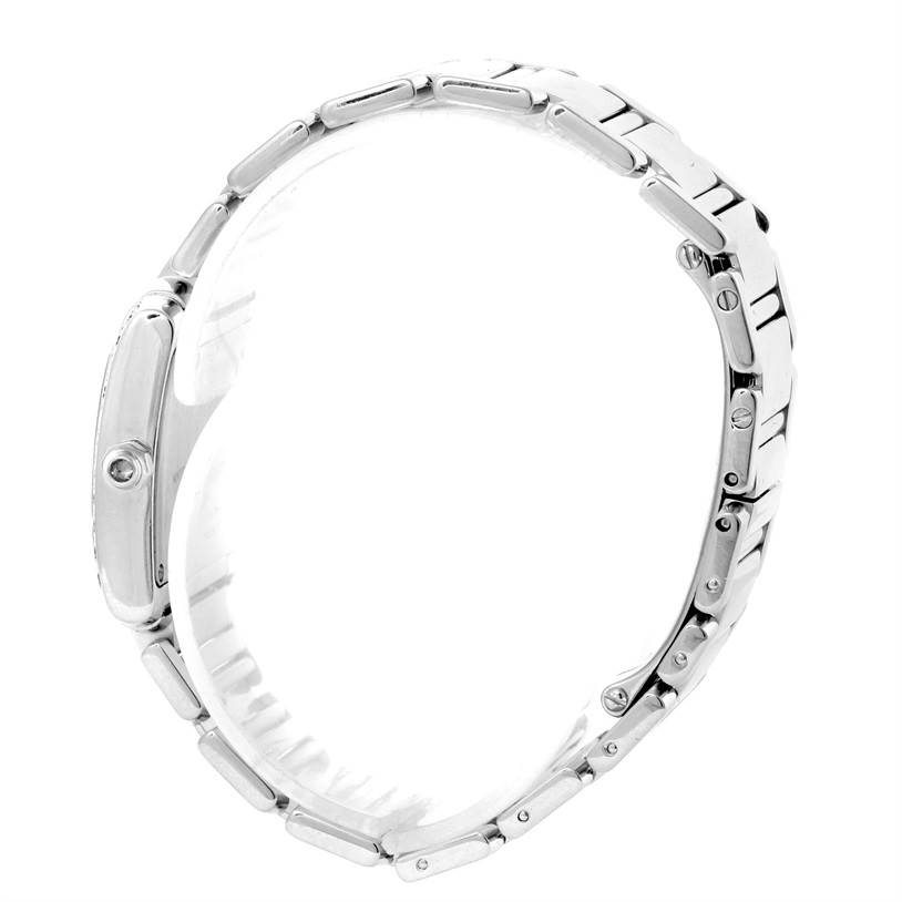 The Cartier Tank Française model watch is shown from the side, highlighting its stainless steel bracelet and case.