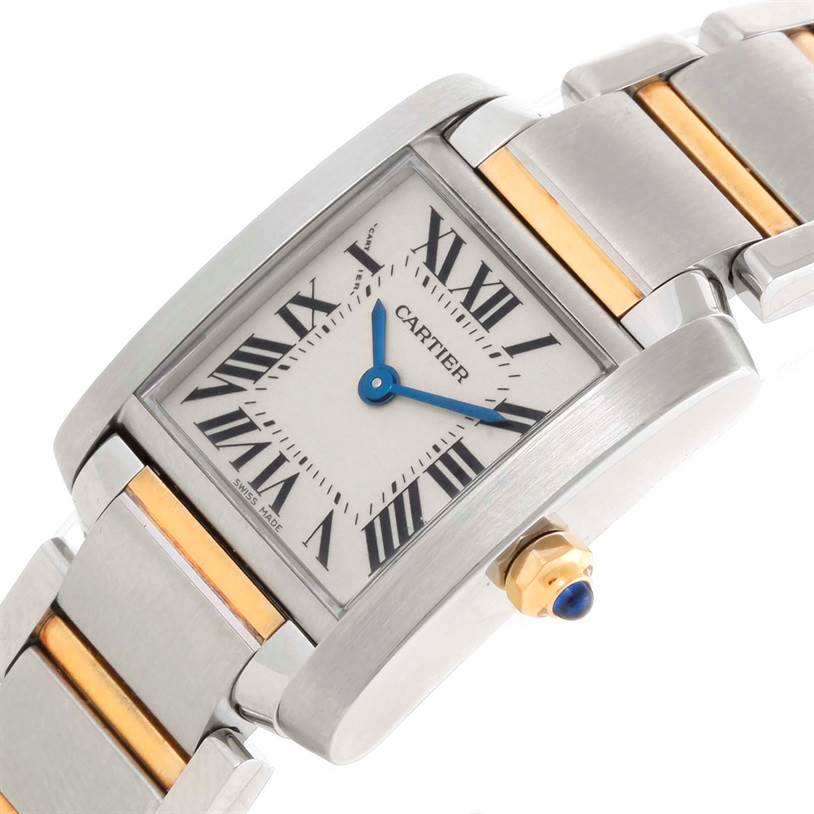 The Cartier Tank Francaise W51007Q4 Women's Steel and Gold (two tone) Silver Dial W51007Q4 Women's Steel and Gold (two tone) Silver Dial watch shown at a slight angle displays the face, crown, and part of the bracelet.