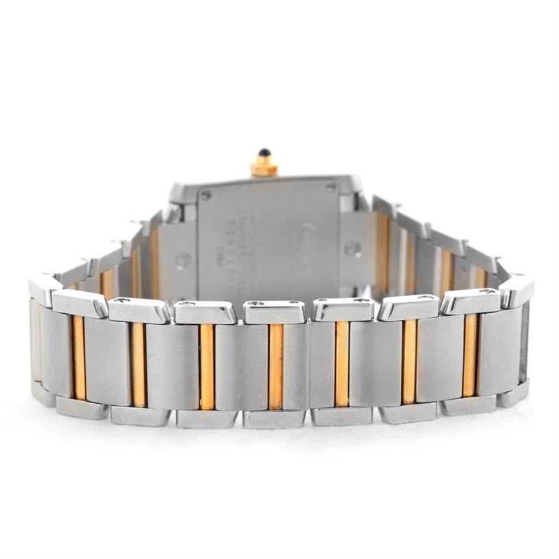 The image shows the band and case of a Cartier Tank Française watch from a rear angle.