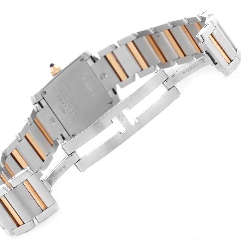 The image shows the back and clasp of a Cartier Tank Francaise W51007Q4 Women's Steel and Gold (two tone) Silver Dial W51007Q4 Women's Steel and Gold (two tone) Silver Dial watch, highlighting the two-tone metal bracelet.