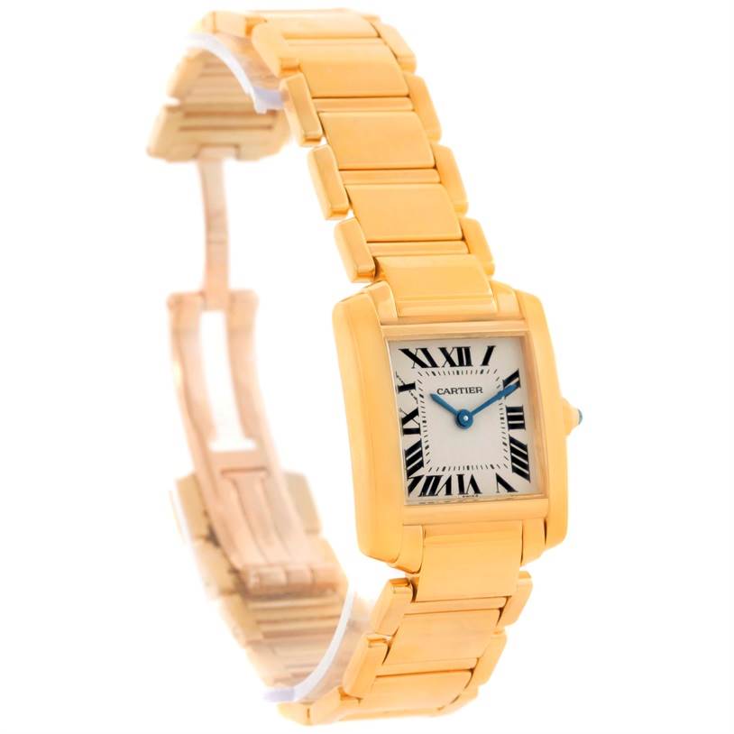 The image shows a Cartier Tank Francaise W50002N2 Women's Yellow Gold Silver Dial W50002N2 Women's Yellow Gold Silver Dial watch at a three-quarter angle highlighting its face, bezel, strap, and clasp.