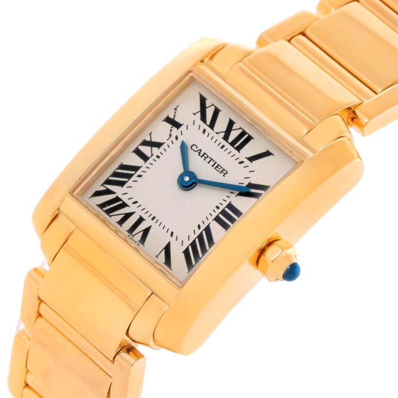 The image shows a Cartier Tank Francaise W50002N2 Women's Yellow Gold Silver Dial W50002N2 Women's Yellow Gold Silver Dial watch at a slight angle, highlighting its gold case, bracelet, and blue hands.