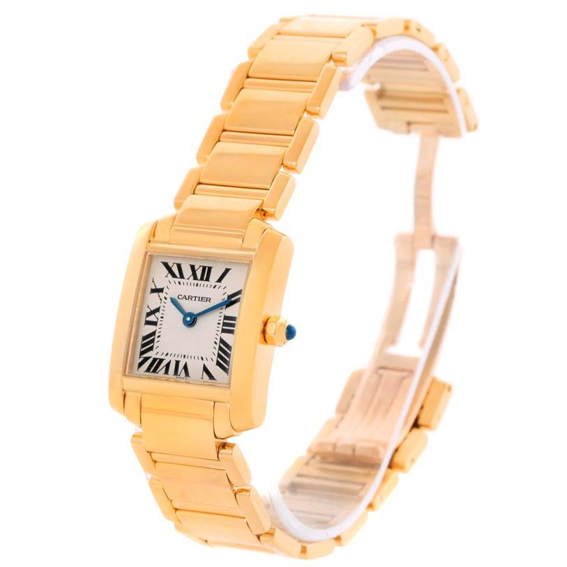 The image shows a Cartier Tank Francaise W50002N2 Women's Yellow Gold Silver Dial W50002N2 Women's Yellow Gold Silver Dial watch at an oblique angle, highlighting its rectangular face and gold bracelet.