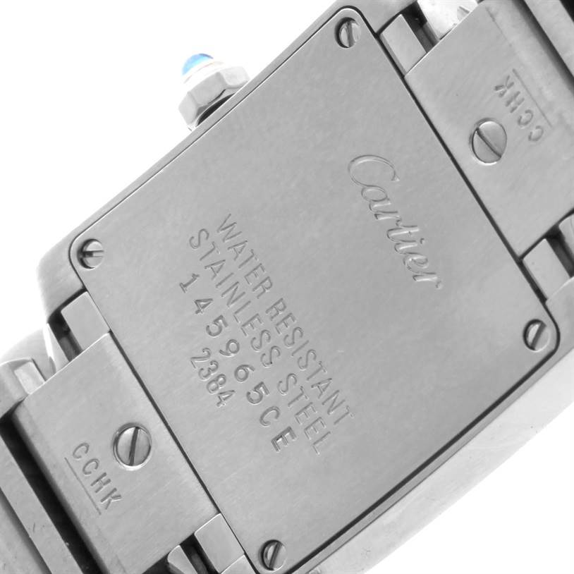 The image shows the back case and part of the band of a Tank Francaise model by Cartier.