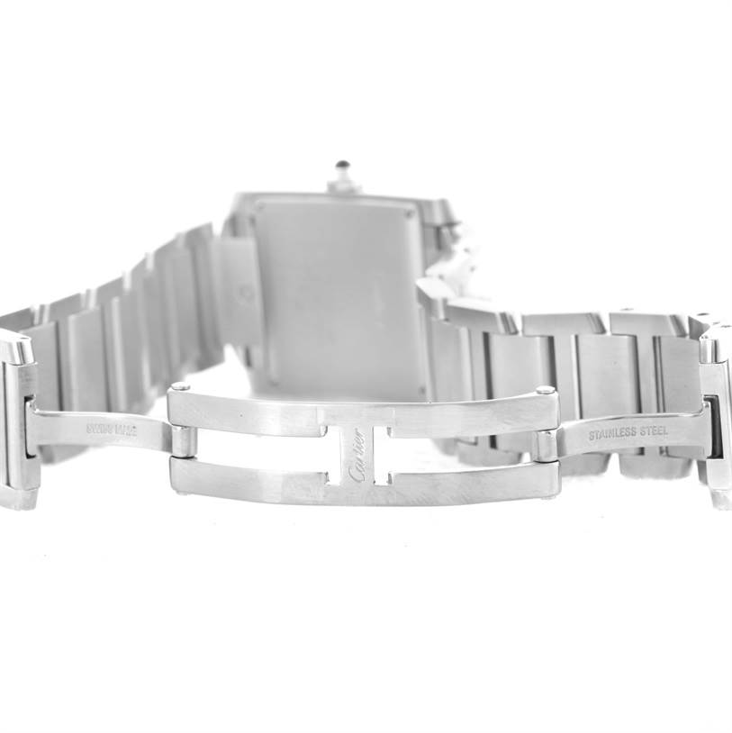 This image shows the back view of a Cartier Tank Française watch, focusing on its stainless steel bracelet and deployment clasp.