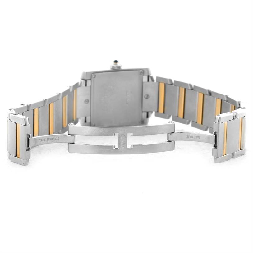 The image shows the back view of a Cartier Tank Francaise W51012Q4 Women's Steel and Gold (two tone) Silver Dial W51012Q4 Women's Steel and Gold (two tone) Silver Dial watch with an open two-tone stainless steel bracelet.