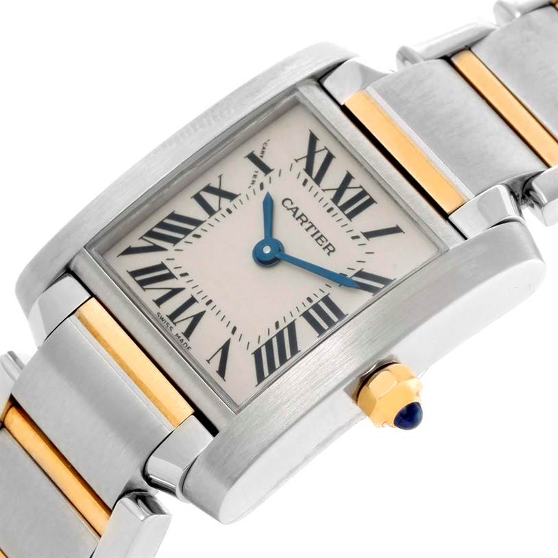 The image shows a close-up angle of the dial and part of the bracelet of a Cartier Tank Francaise W51007Q4 Women's Steel and Gold (two tone) Silver Dial W51007Q4 Women's Steel and Gold (two tone) Silver Dial watch.