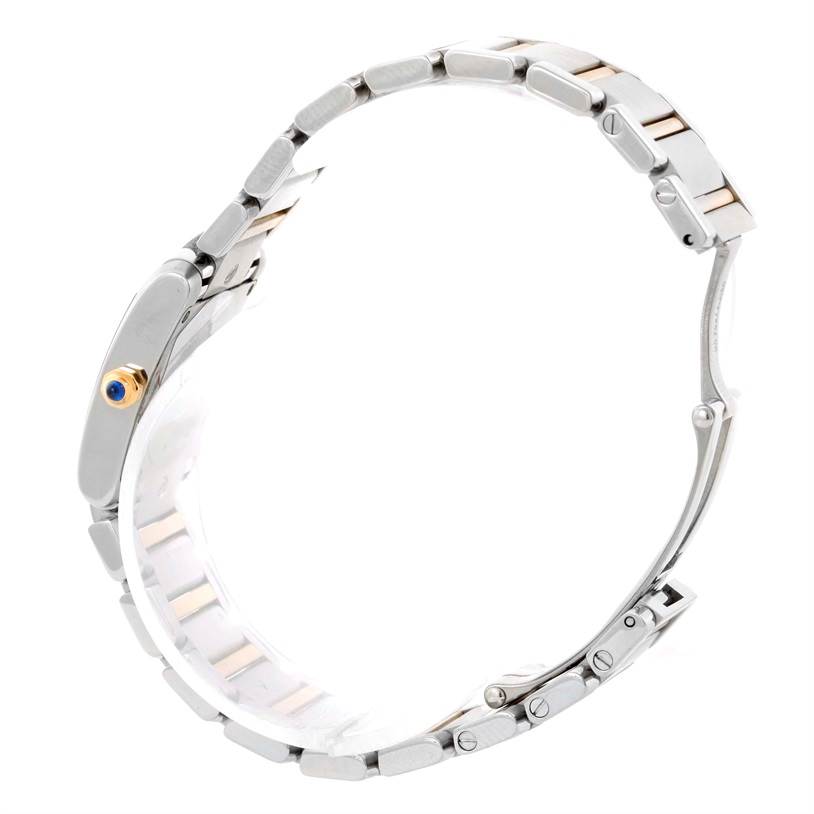 This image shows a side view of the Cartier Tank Francaise W51007Q4 Women's Steel and Gold (two tone) Silver Dial W51007Q4 Women's Steel and Gold (two tone) Silver Dial watch, highlighting its bracelet and crown.