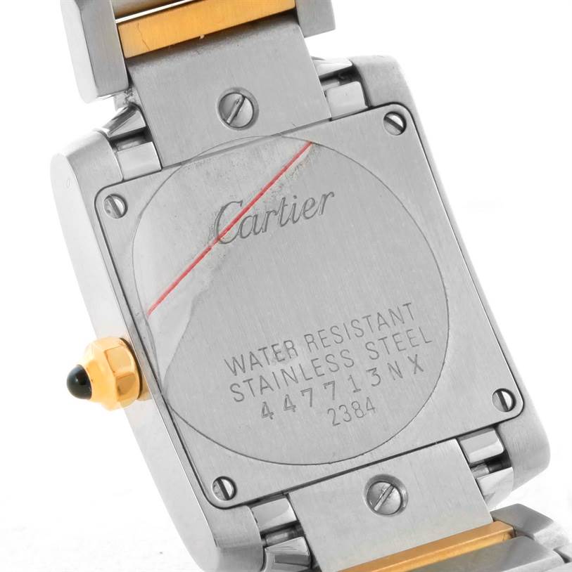 This image shows the back view of a Cartier Tank Française watch, focusing on the case back, crown, and part of the bracelet.