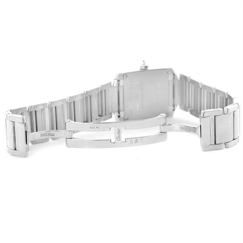 The image shows the reverse angle of a Cartier Tank Francaise WE1002S3 Women's White Gold Silver Dial WE1002S3 Women's White Gold Silver Dial watch, focusing on its open stainless steel bracelet and clasp.