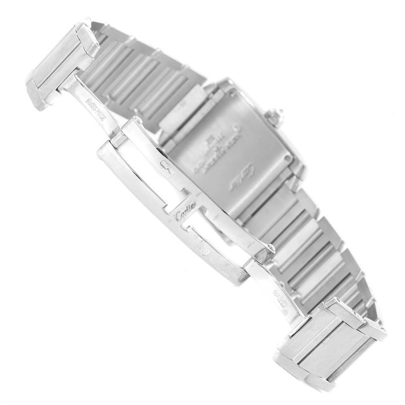 The image shows the clasp and bracelet of a Cartier Tank Française watch, viewed from the underside at an angle.