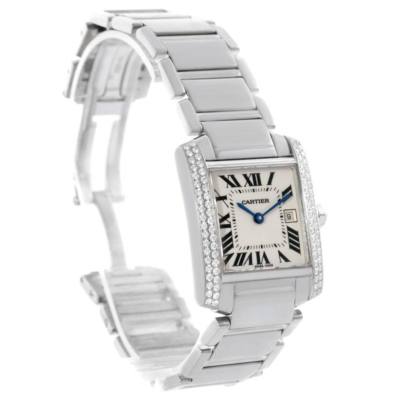 The image shows a Cartier Tank Française watch featuring a rectangular face and metal bracelet at a slight angle.