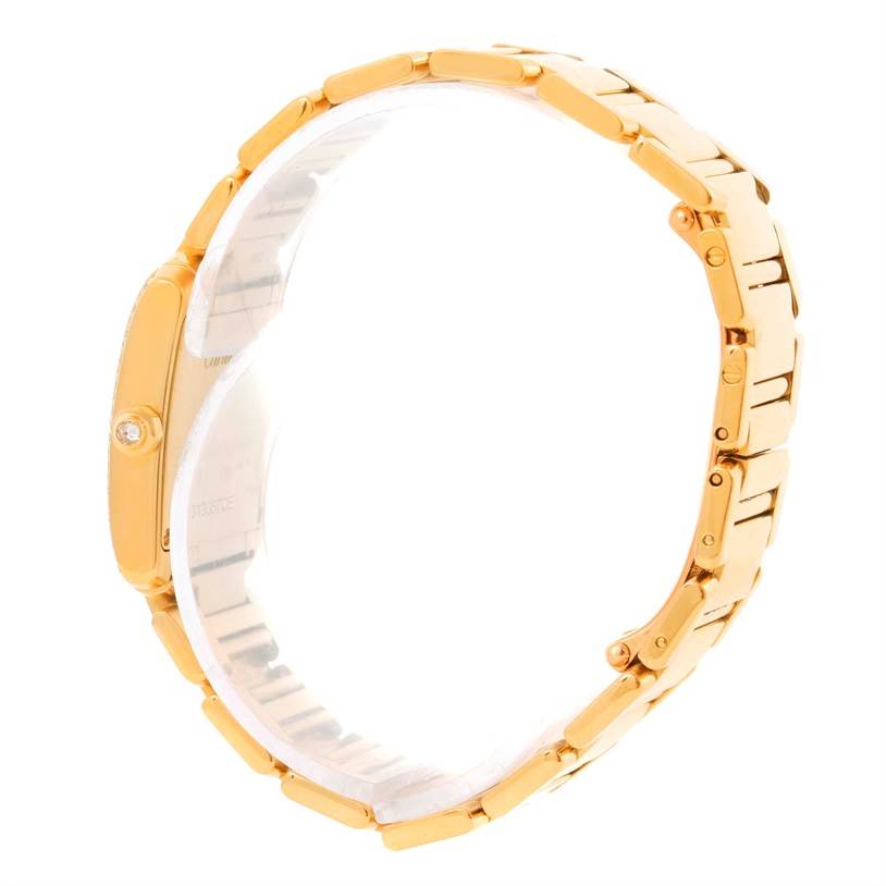 This image shows a Cartier Tank Francaise WE1001R8 Women's Yellow Gold Silver Dial WE1001R8 Women's Yellow Gold Silver Dial watch from a side angle, highlighting its gold bracelet and side profile.