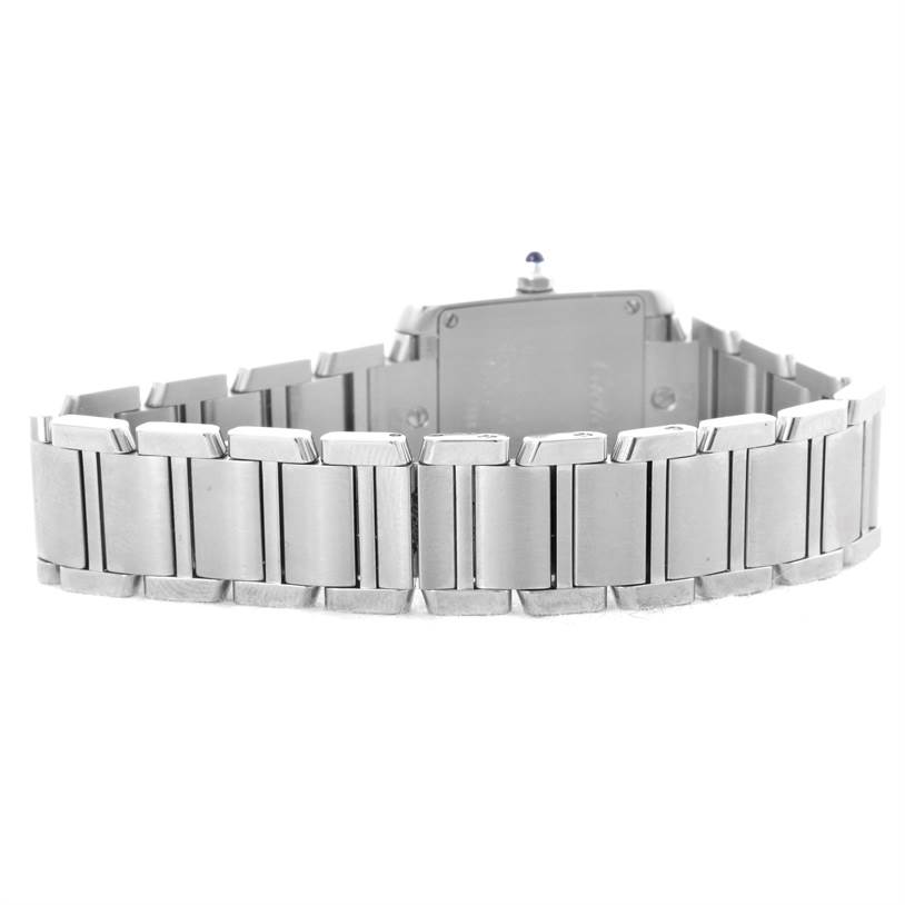 The image shows the back and bracelet of a Cartier Tank Francaise W51008Q3 Women's Stainless Steel Silver Dial W51008Q3 Women's Stainless Steel Silver Dial watch from a slightly elevated angle.