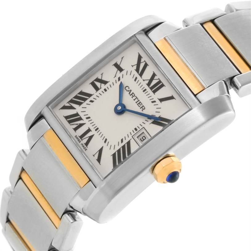The image shows a close-up angle of the Cartier Tank Française watch, highlighting its face, crown, and two-tone metal bracelet.