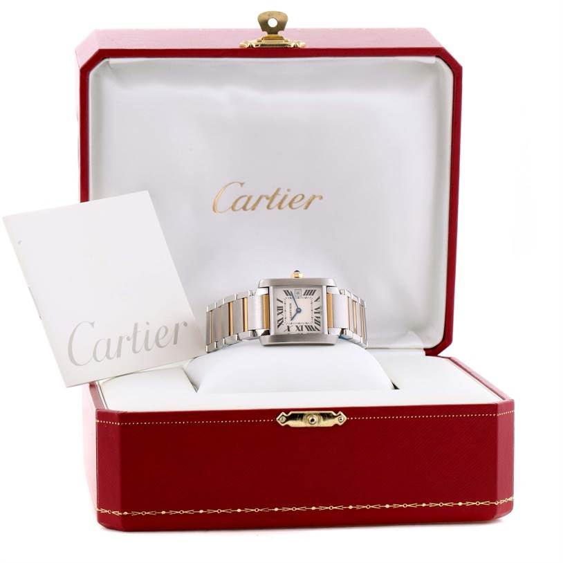 The Cartier Tank Francaise W51012Q4 Women's Steel and Gold (two tone) Silver Dial W51012Q4 Women's Steel and Gold (two tone) Silver Dial watch is shown from the front inside its branded red box, alongside a Cartier booklet.