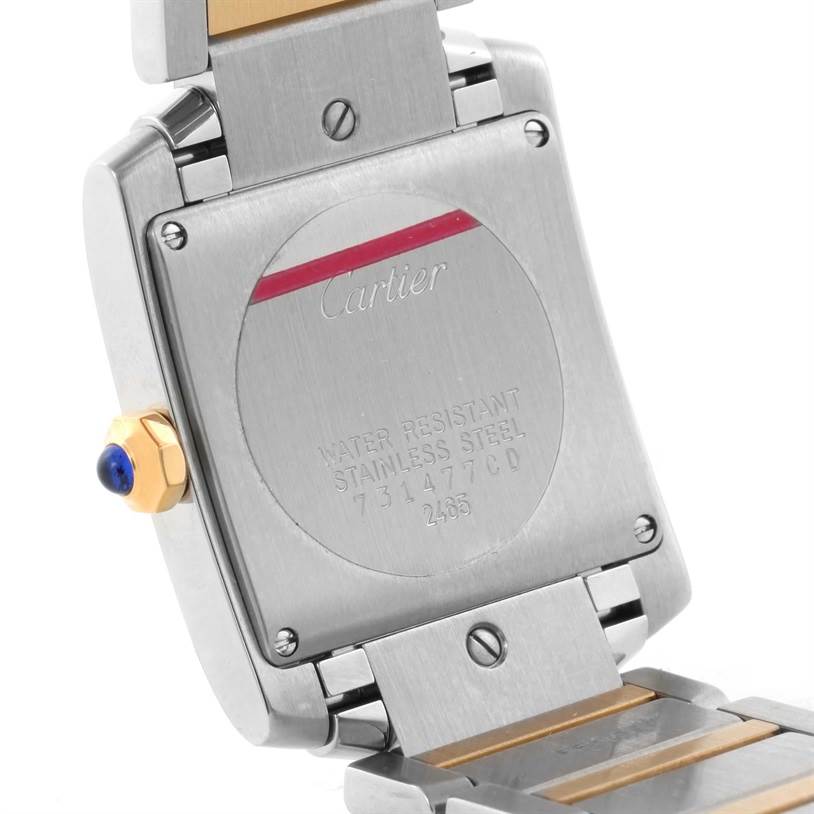 This image shows the back view of a Cartier Tank Francaise W51012Q4 Women's Steel and Gold (two tone) Silver Dial W51012Q4 Women's Steel and Gold (two tone) Silver Dial watch, highlighting the stainless steel back plate, serial number, and crown.