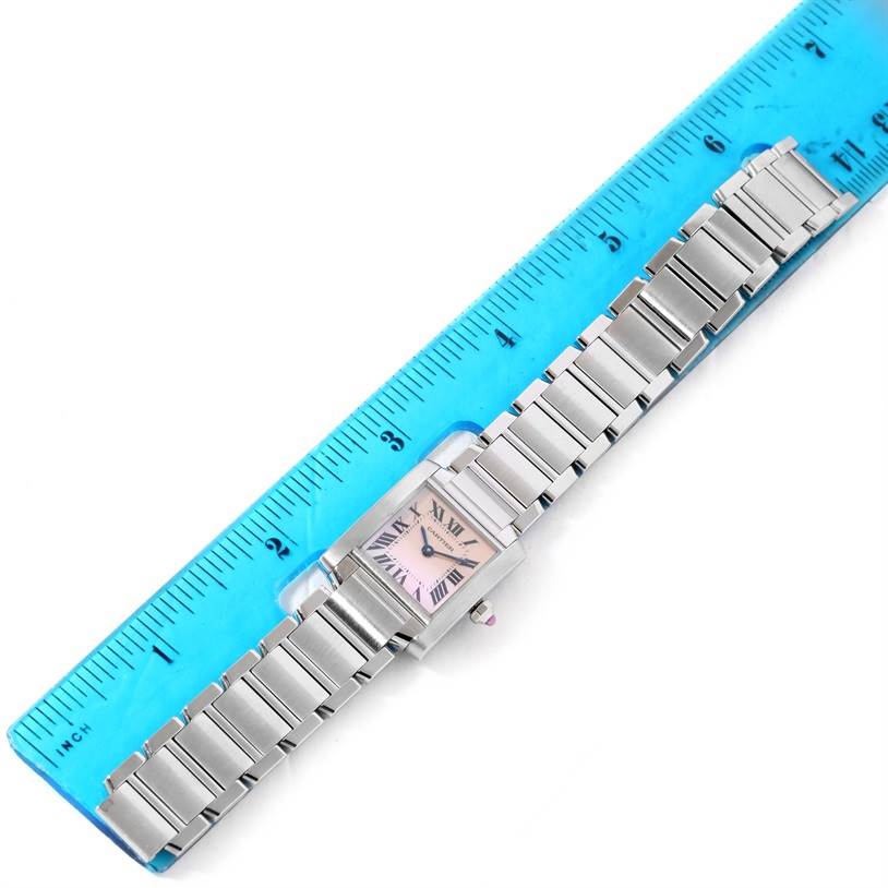 The Cartier Tank Francaise W51028Q3 Women's Stainless Steel Mother of Pearl Dial W51028Q3 Women's Stainless Steel Mother of Pearl Dial watch is shown from a top view with its full bracelet alongside a ruler for size reference.