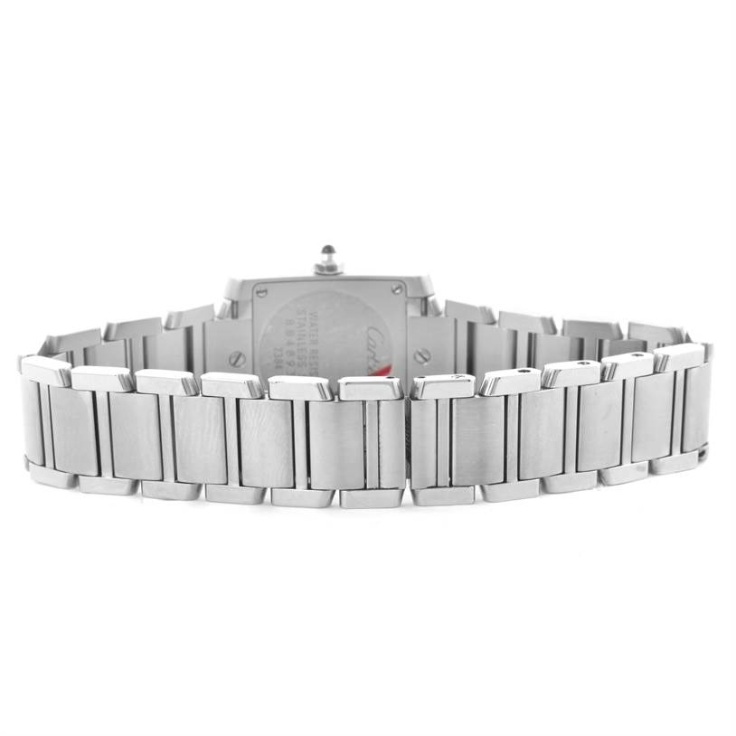 This image shows the back view of the Tank Française model watch by Cartier with a focus on its metal bracelet.