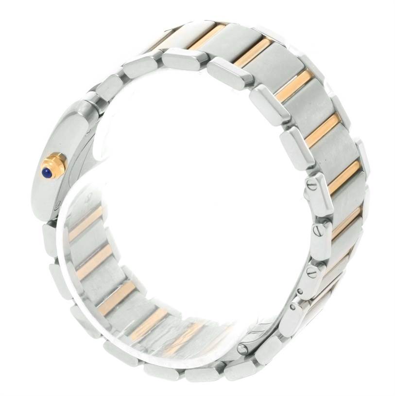 The image shows a side view of the Tank Française model by Cartier, highlighting the bracelet and crown.
