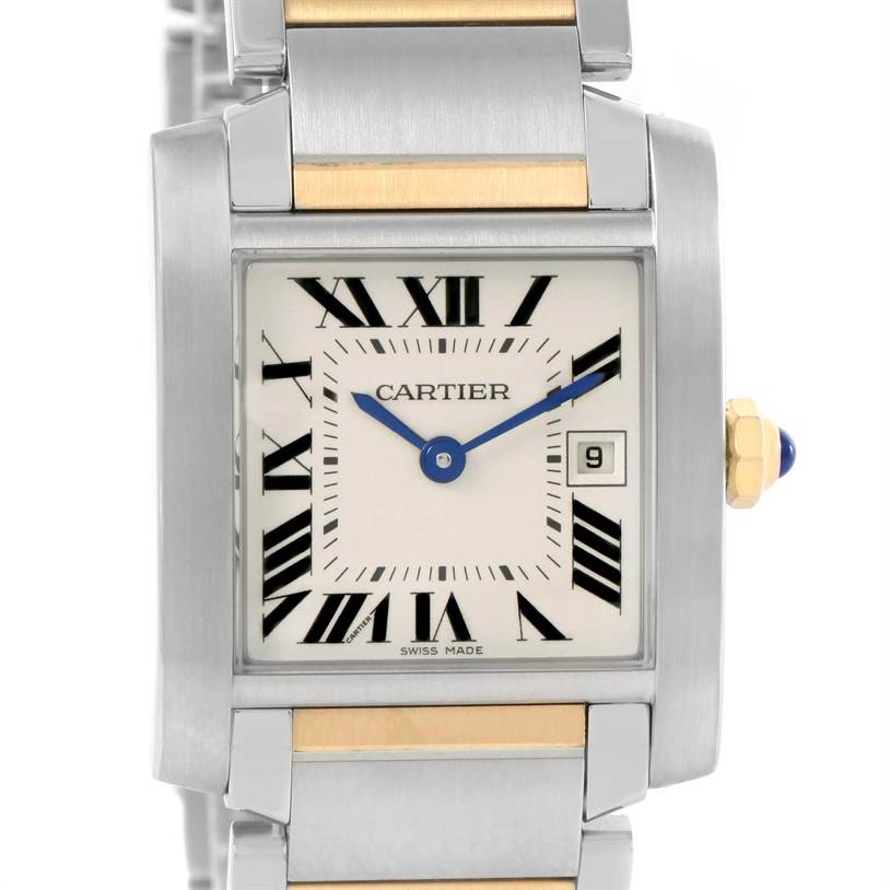 This close-up shows the Tank Francaise watch by Cartier, highlighting the face, Roman numerals, and part of the bracelet.